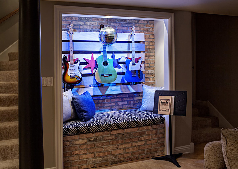 Brick wall inset with bench, guitar display and Chicago flag decor