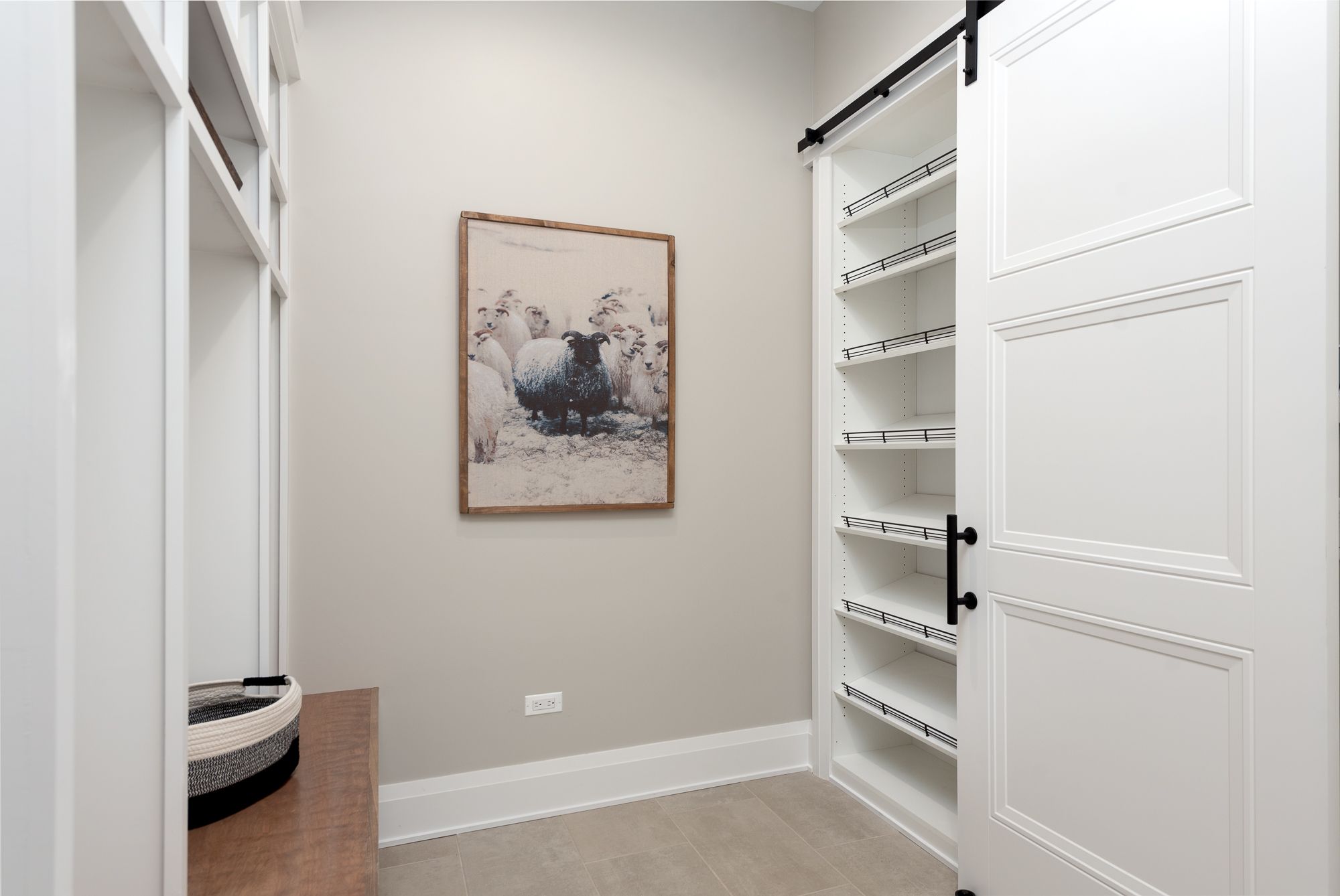 Mud room with white built in cabinet shoe rack